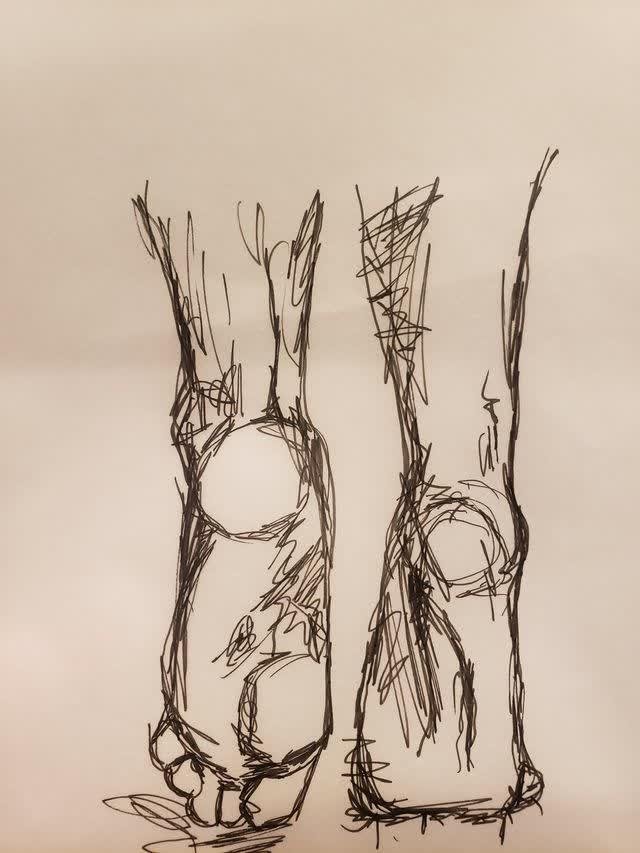 Gestural pen study of two bare feet seen from the soles, toes at the bottom of the frame; energetic black scribbled lines build the forms on white paper.