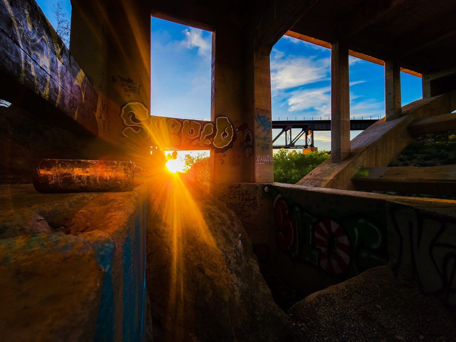 Picture of graffiti under a train bridge